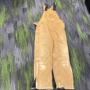 Insulated carhartt bibs size 16.   Crotch was stitched up by prof seamstress
